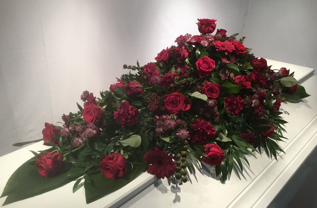 Kistepynt, røde blomster